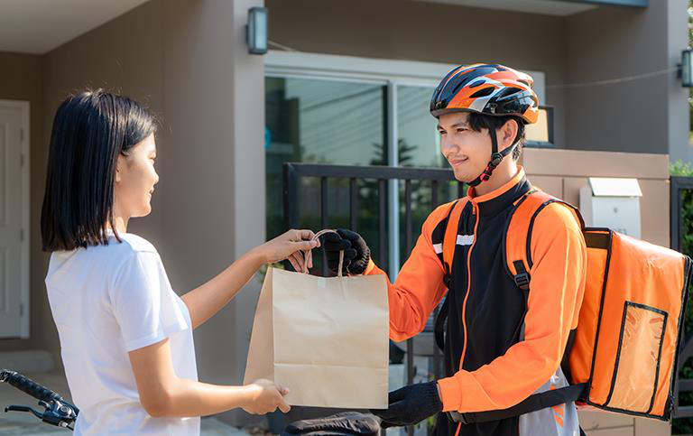 Rider completing a customer handover